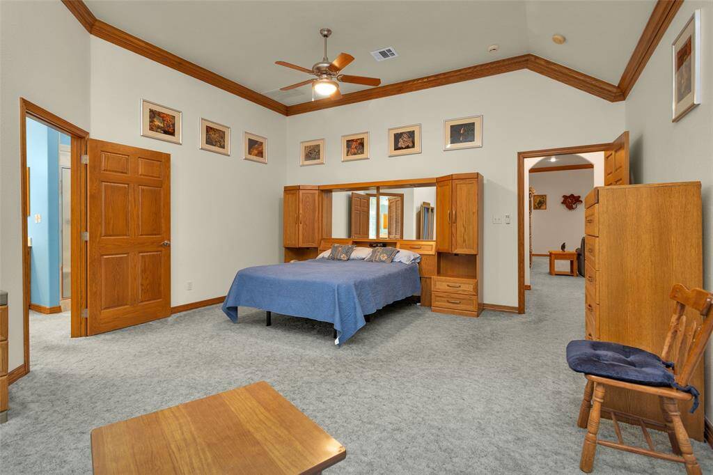 The spacious primary bedroom is a peaceful retreat with plenty of natural light and room for relaxation. It offers easy access to an en-suite bathroom, providing a true sanctuary to unwind after a long day.