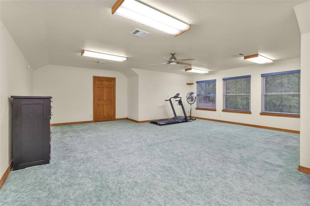 A spacious 20x21 upstairs game room is a standout feature, providing ample room for entertainment and relaxation. Imagine game nights, movies, or lounging in this versatile space!