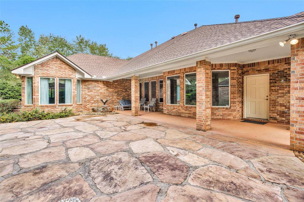 Step out to the lovely outdoor patio—a perfect spot for morning coffee, evening relaxation, or outdoor dining. Overlooking the backyard, it’s a wonderful space to enjoy the peaceful surroundings.