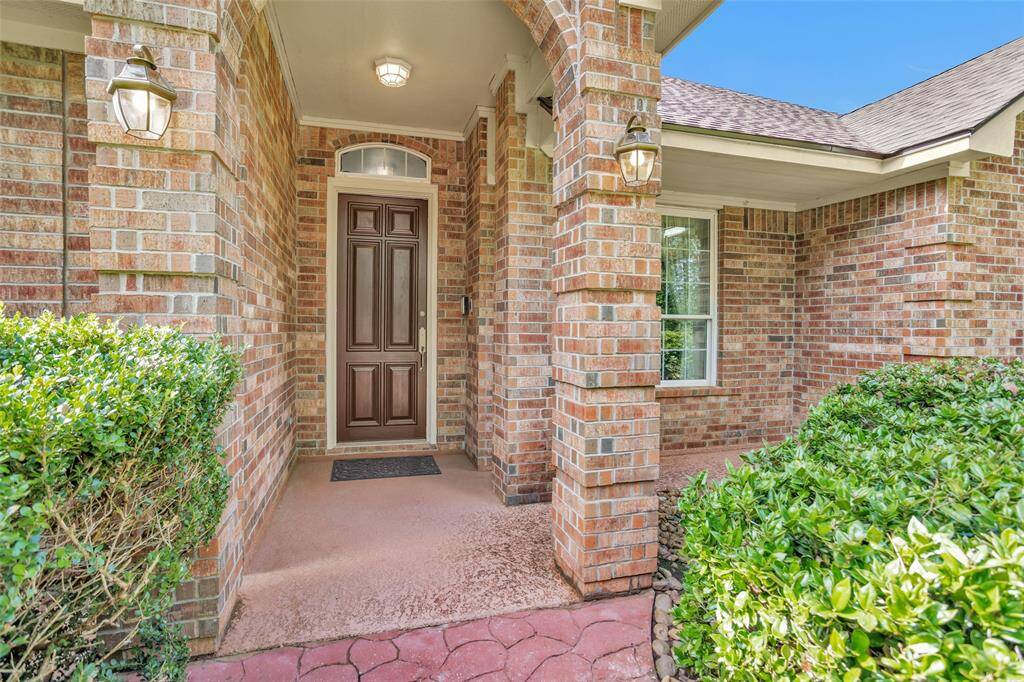 You are welcomed by a beautiful and a all brick exterior.