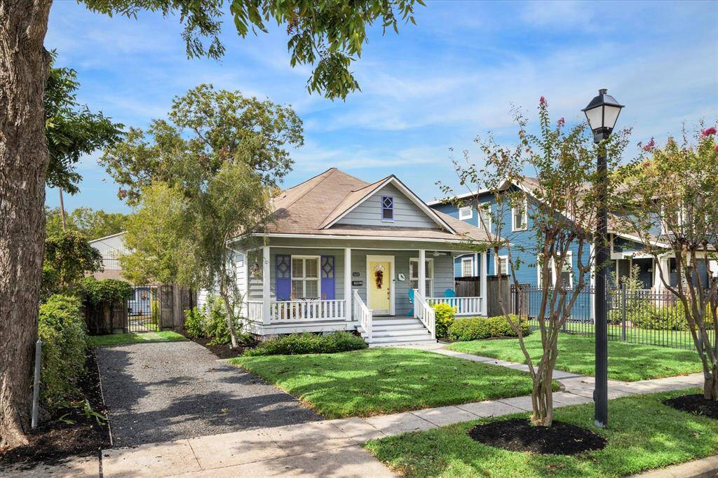 This delightful home on a wonderful street boasts a fantastic front porch ideal for relaxing, along with a driveway for convenient off-street parking.