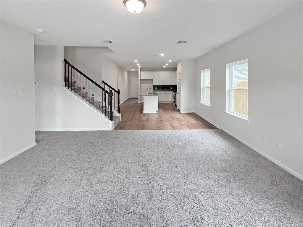 The Waring III- Family Room into Kitchen