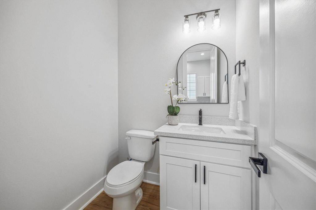 Half bath off the kitchen on the 2nd floor