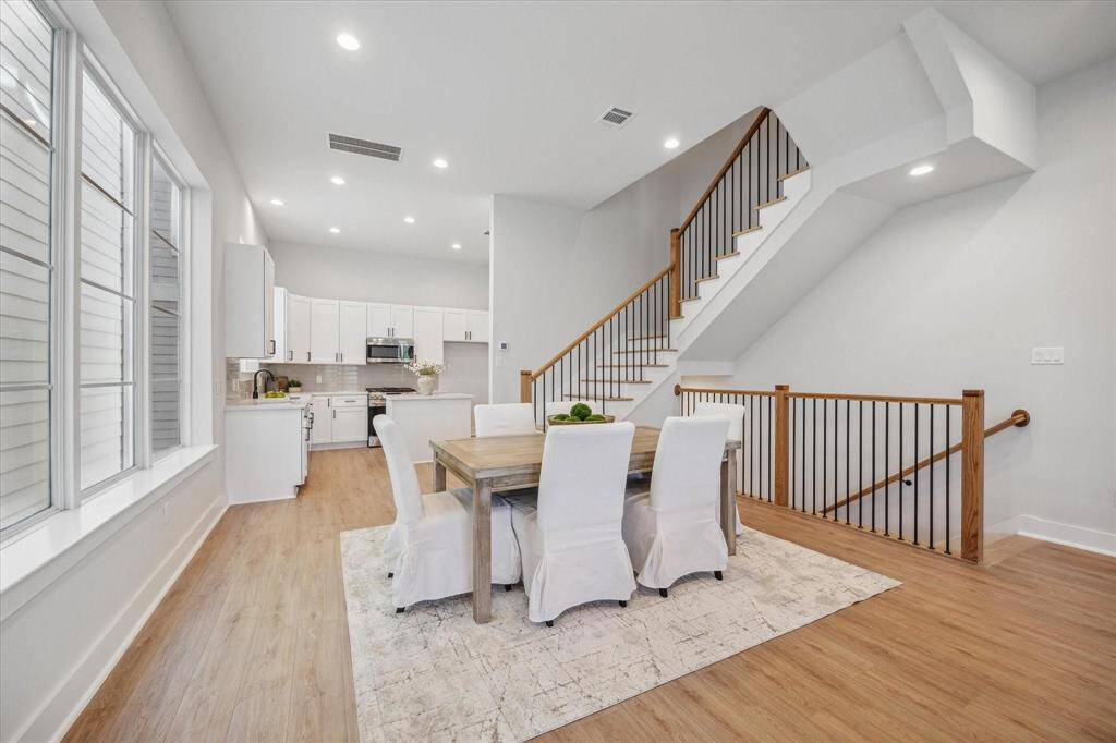 The second floor stands as the heart of this home, drawing you in with its open-concept layout and creating a warm and inviting space.