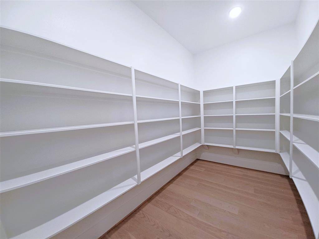 This pantry is ideal for stocking up, offering ample space for bulk items and groceries. With its thoughtfully designed shelving and storage solutions, you'll never run out of room for your essentials.