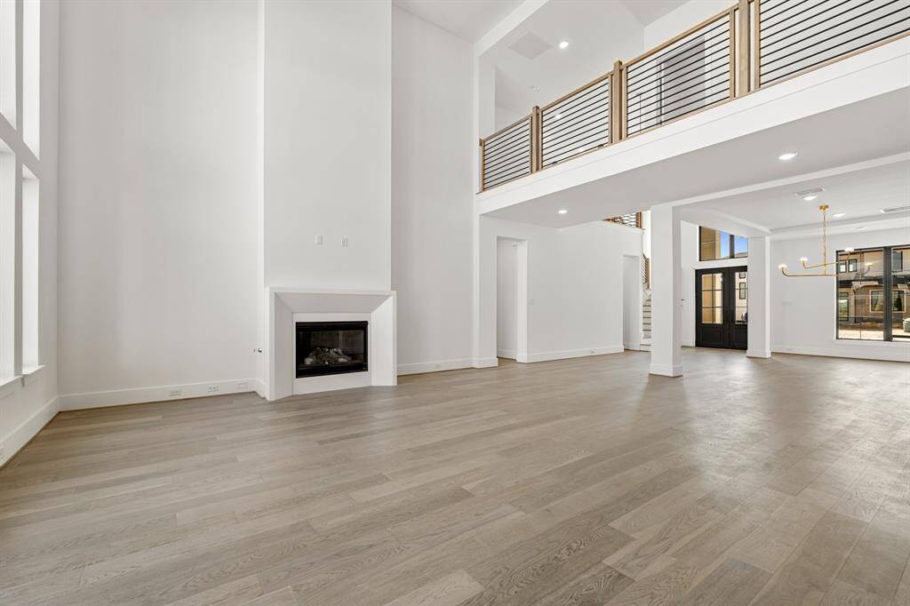 Warm and welcoming, the family room centers around a beautifully crafted fireplace.