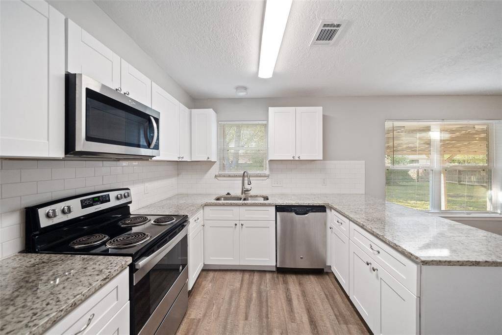 Notice the stainless steel appliances.