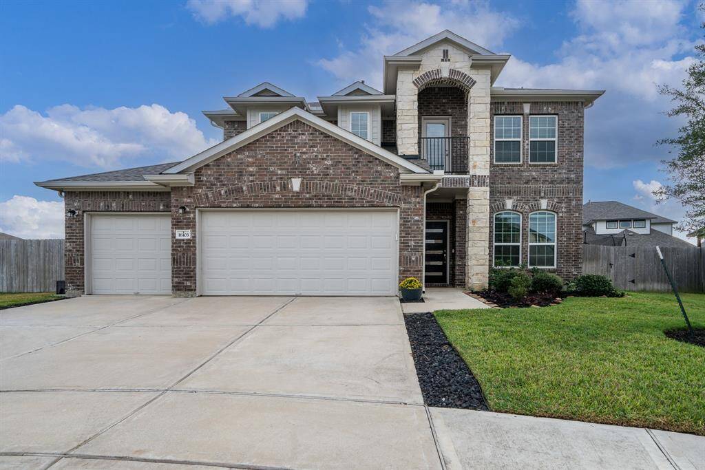 Nestled at the end of a cul-de-sac, this home features an oversized lot.