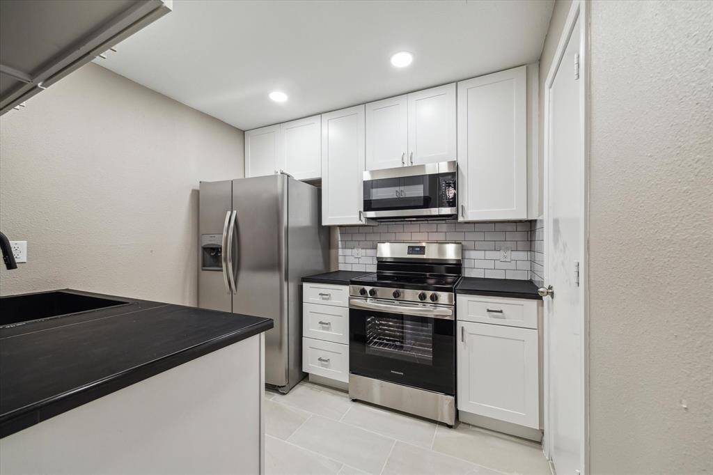 Updates;cabinets,countertops,range,microwave,lighting