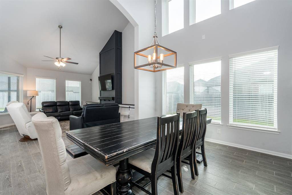 As you enter the main living area you are greeted by a spacious casual dining room with a wall of windows that flows seamlessly into the spectacular family room!