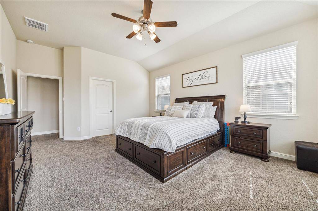 The Primary bedroom is tucked away for privacy.  Just through those double doors is a massive spa like bathroom.