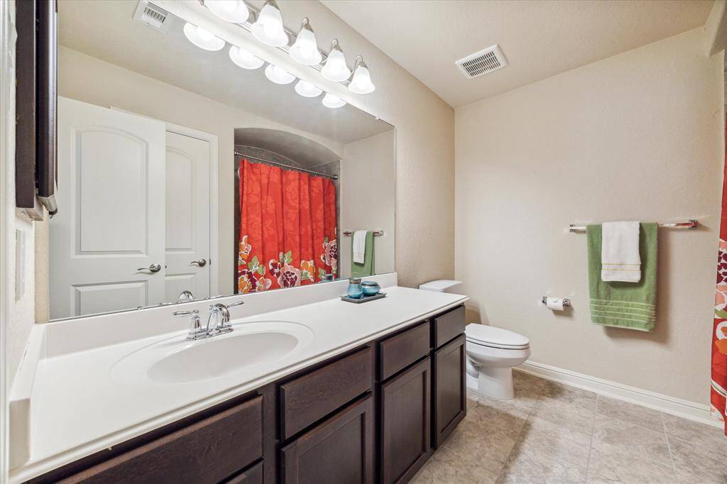 One of the secondary baths upstairs.