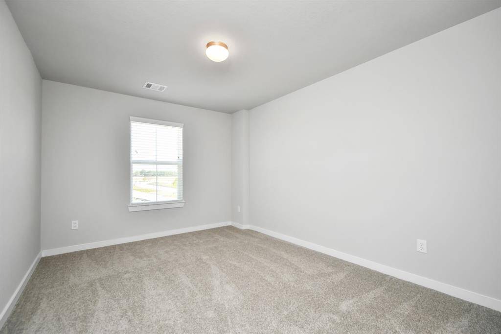 Sample photo of completed home with similar floor plan. Actual colors and selections may vary.