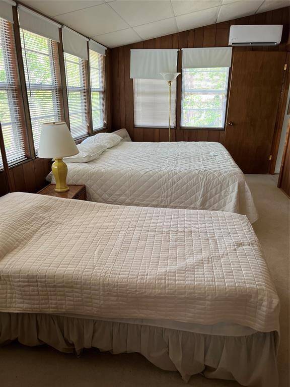 Large bedroom upstairs with a king and single bed