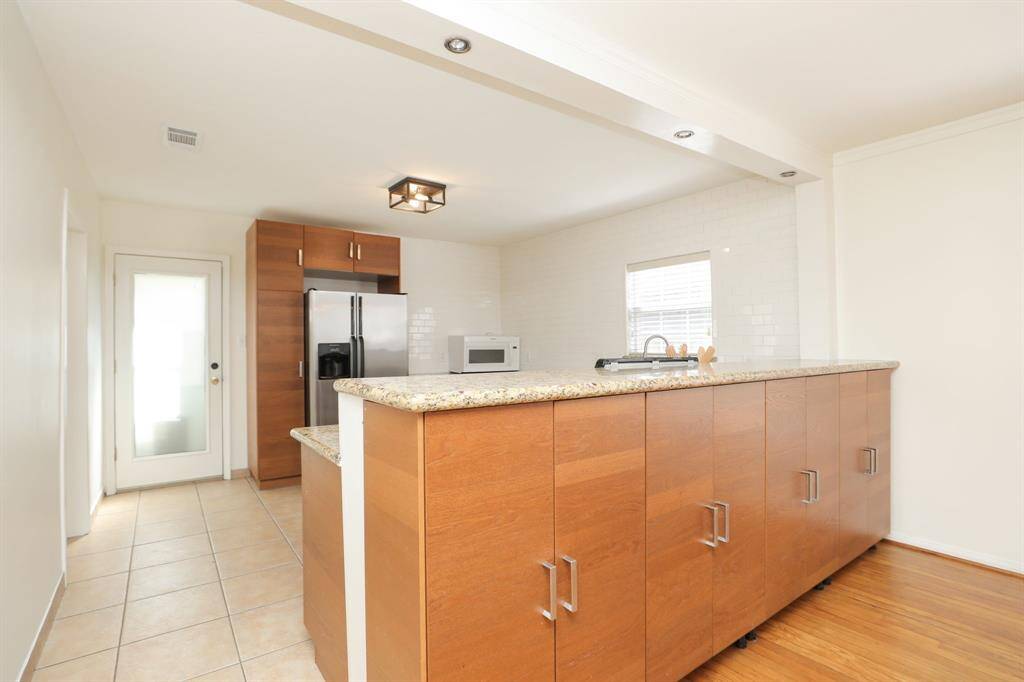 Close-up of bar and cabinetry.