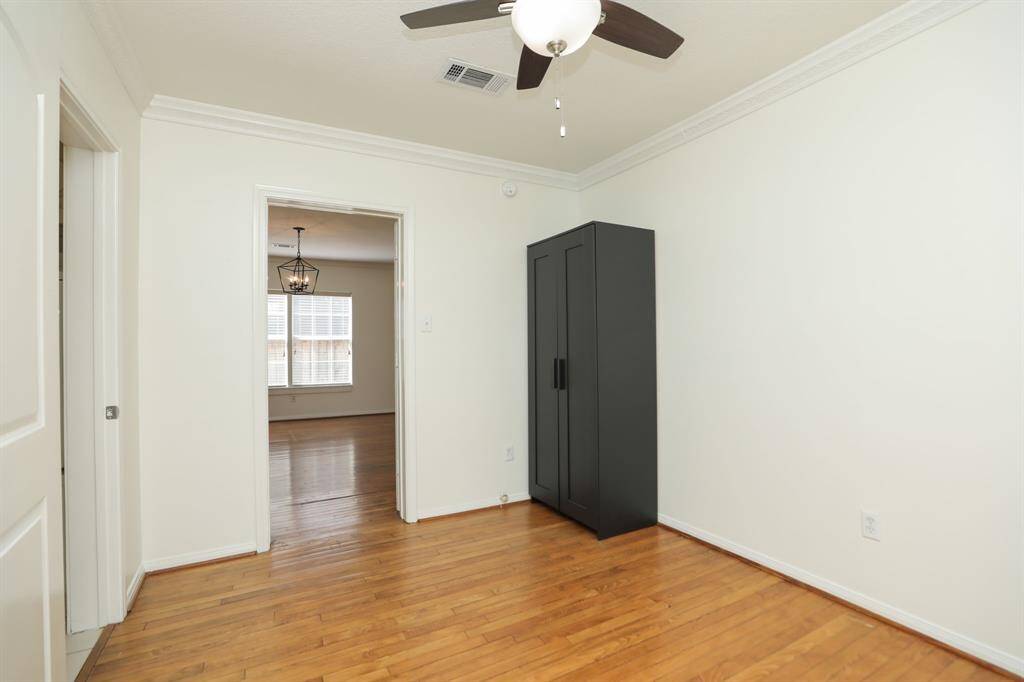 View of middle secondary bedroom.