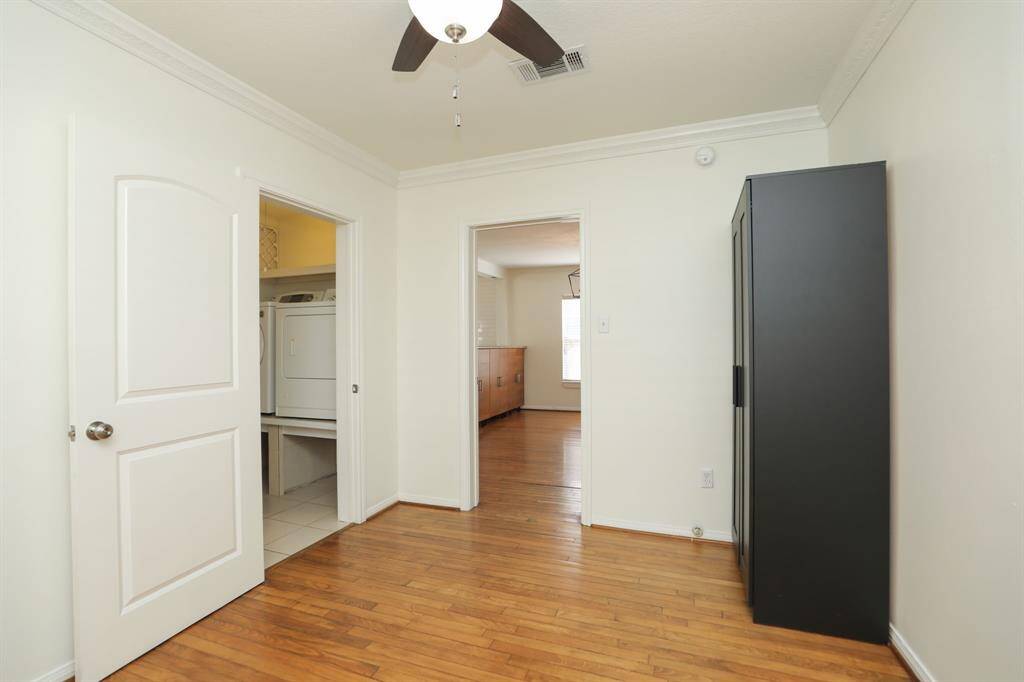 Secondary bedroom off dining.