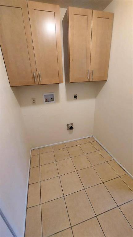 Laundry Room Also Has the Pantry on the Opposite Wall