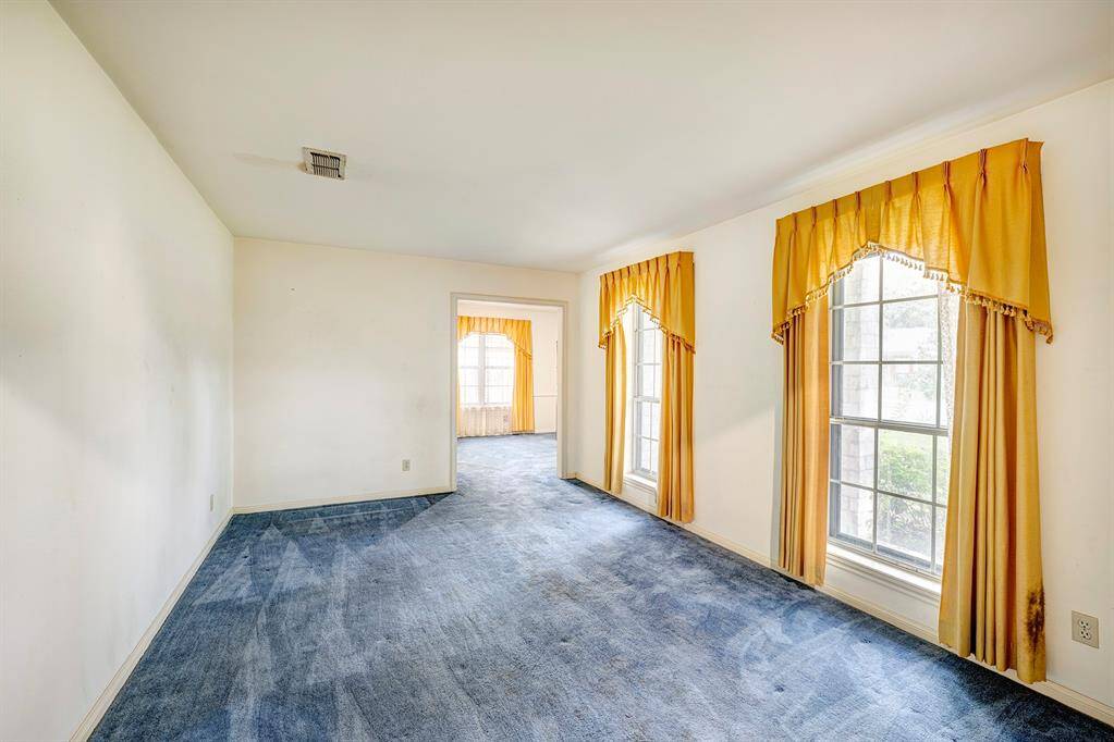 Front living room is a great space to enjoy quiet conversation.