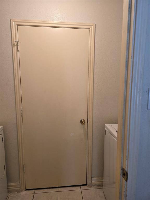 Utility room between kitchen and garage.