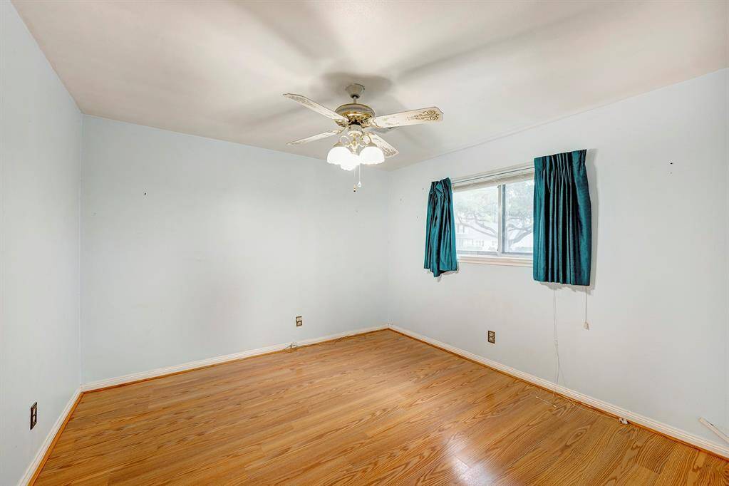 Second bedroom downstairs is perfect as a guestroom or home office.