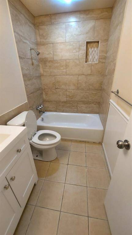 Newly Tiled Walls With Inlaid Soapbox