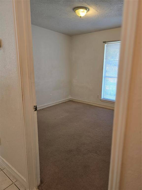 One of two secondary bedrooms.