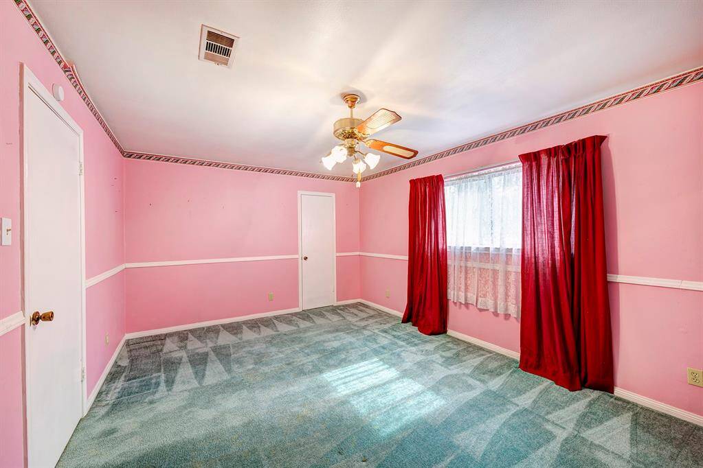 Another of the upstairs secondary bedrooms.