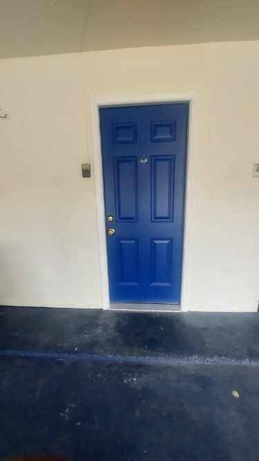The Two Car Attached Garage Has Access to the House Through This Door.
