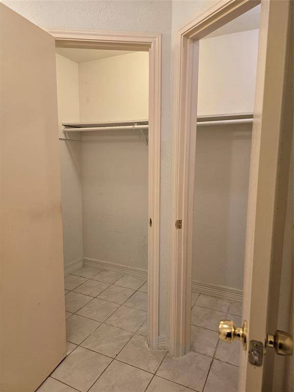 Primary walk in closets.