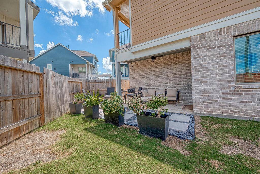 Welcome to this contemporary 3-story home in the master-planned community of Elyson. Featuring 3 spacious bedrooms and 2.5 baths, this home offers modern living at its finest. Enjoy a nice-sized backyard with a covered patio, perfect for outdoor gatherings, and no back neighbors for added privacy. The well-designed layout provides ample space and natural light throughout, making it ideal for both relaxation and entertaining. Experience the perfect blend of style and convenience in this beautiful Elyson home