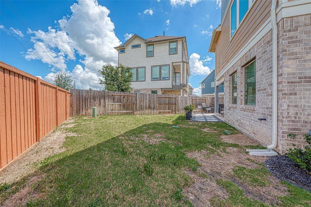 Welcome to this contemporary 3-story home in the master-planned community of Elyson. Featuring 3 spacious bedrooms and 2.5 baths, this home offers modern living at its finest. Enjoy a nice-sized backyard with a covered patio, perfect for outdoor gatherings, and no back neighbors for added privacy. The well-designed layout provides ample space and natural light throughout, making it ideal for both relaxation and entertaining. Experience the perfect blend of style and convenience in this beautiful Elyson home
