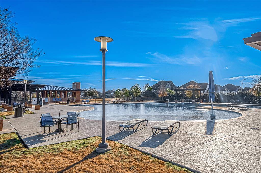 Located in Katy, Texas, the master-planned community of Elyson offers a vibrant lifestyle with exceptional amenities. Residents enjoy a state-of-the-art clubhouse, several playgrounds, scenic walking trails, and multiple swimming pools. The community fosters an active, family-friendly environment with beautifully landscaped parks and recreational facilities. With its welcoming atmosphere and numerous amenities, Elyson is the perfect place to call home.