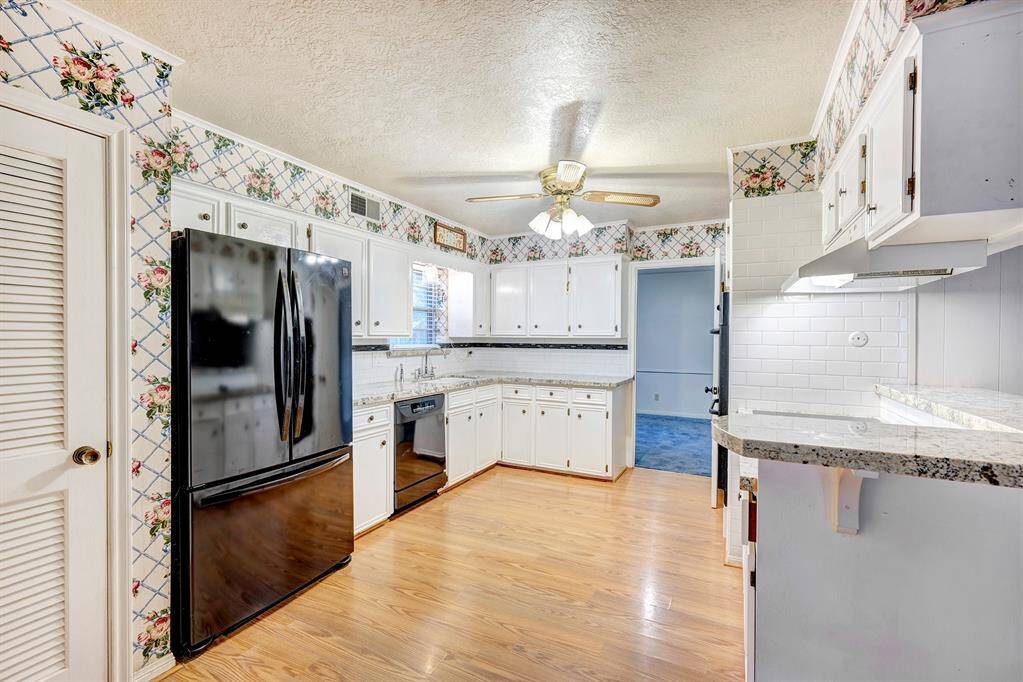 Another view of the kitchen which leads to the dining room.