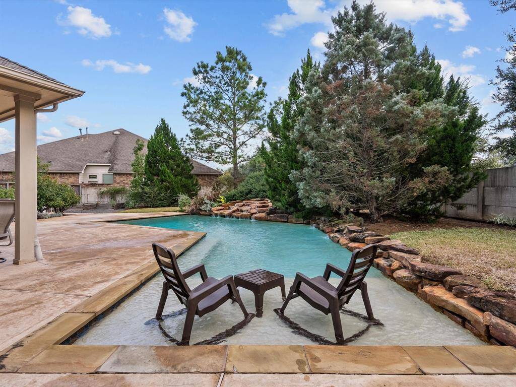 Sparkling Pool With A Sun Ledge