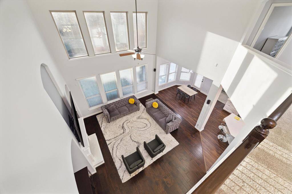 This view highlights the vast openness of the entire first floor, offering endless possibilities to personalize the space and make it your own. The layout provides ample room for creativity and customization, allowing you to design a home that suits your style.