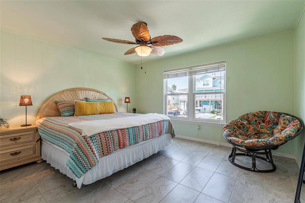 This spacious secondary bedroom offers plenty of room to comfortably fit a king-size bed, with large window provding an open and airy feel creating a serene retreat