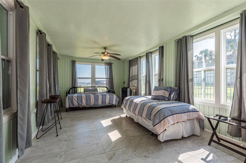 The generously sized guest suite offers ample space to accommodate multiple beds, and a well-appointed ensuite,  ideal for hosting family or friends.