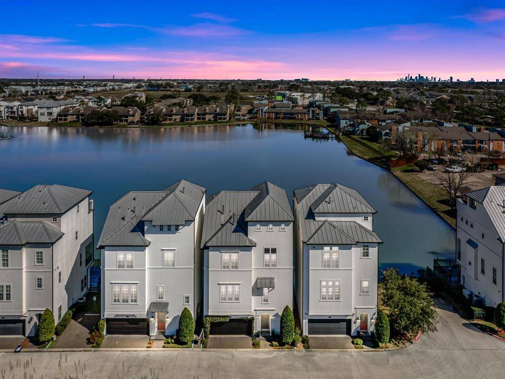 Your new home awaits! Lakefront living + private boat deck within a prestigious gated community!