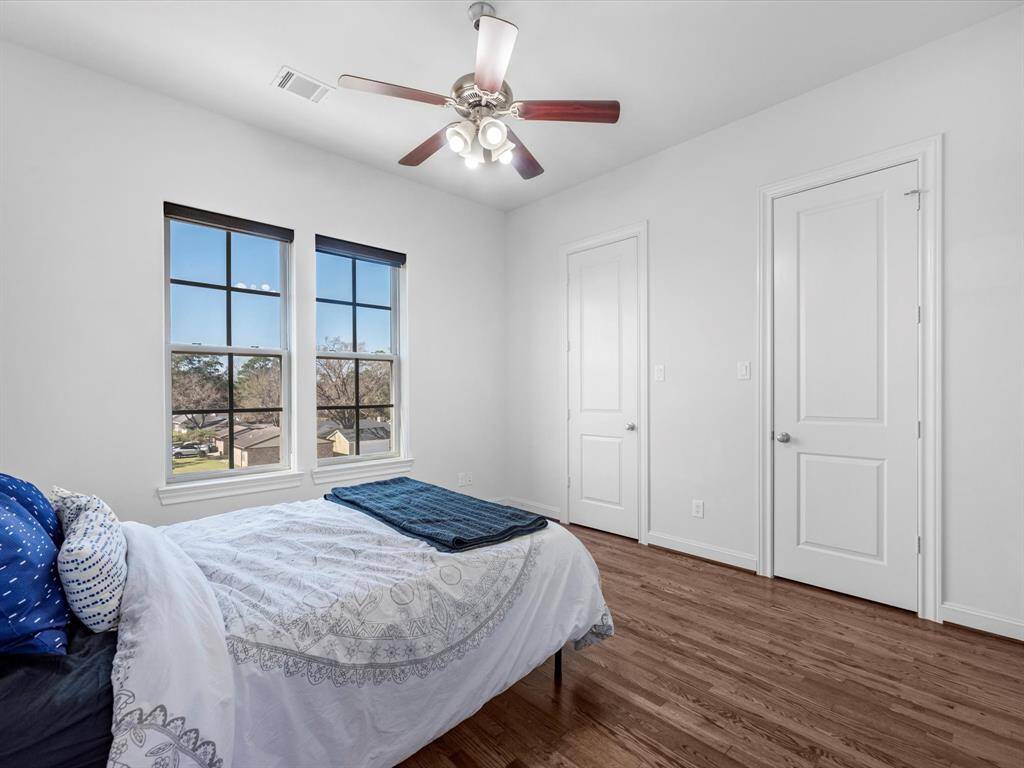 Secondary bedroom with it's own ensuite bath and two closets.