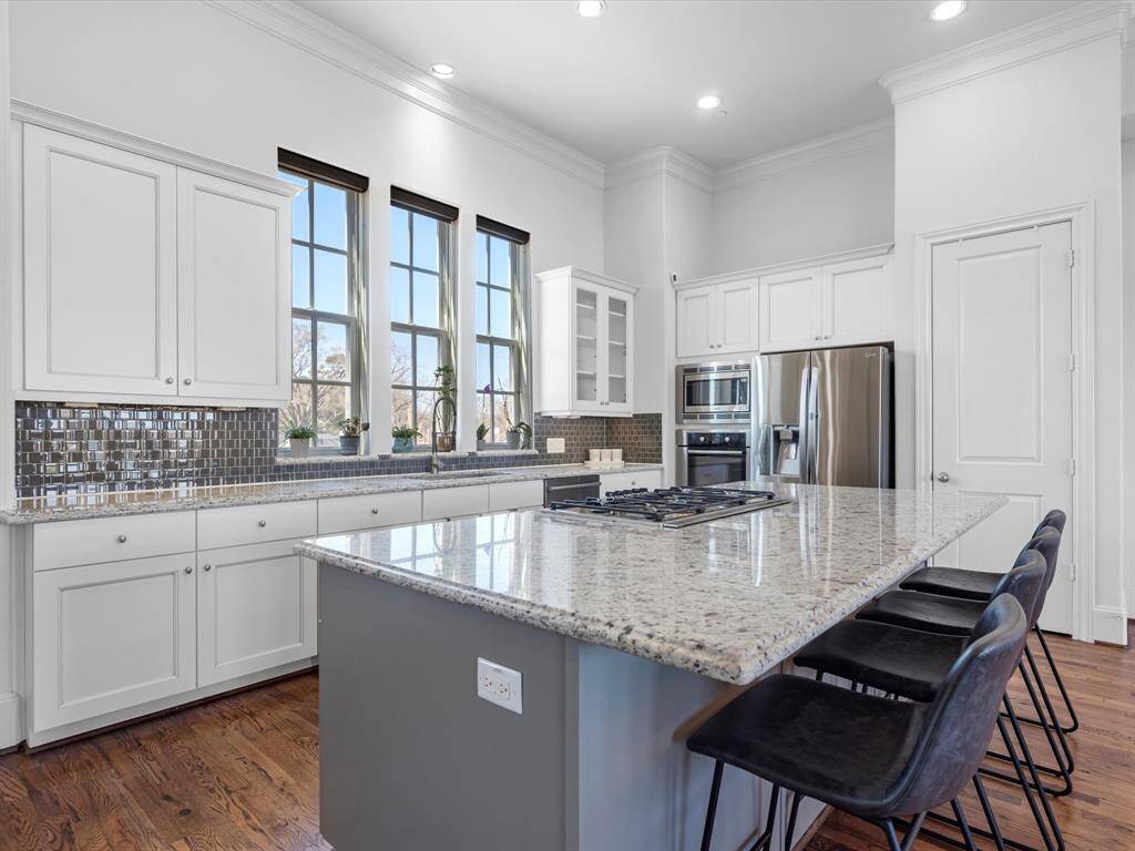 Your Grand Island offers ample space for barstools and effortless entertaining.
