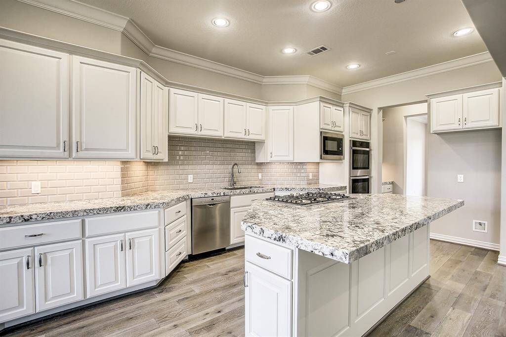 Cozy breakfast room with door to the backyard and patio.