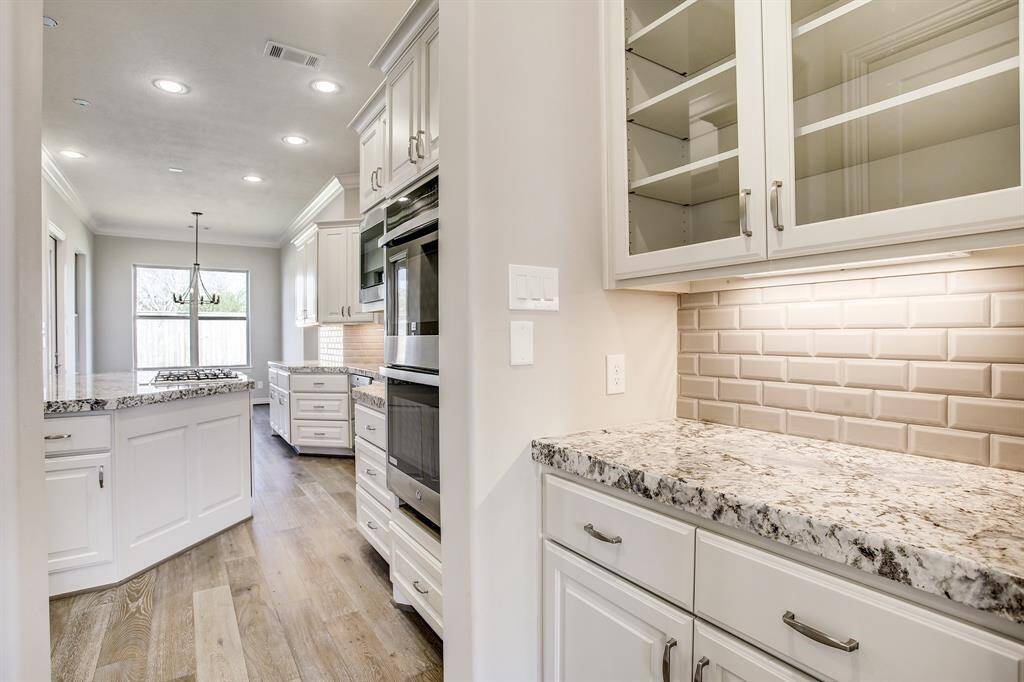 Master bedroom is large and has an access door to the back patio.