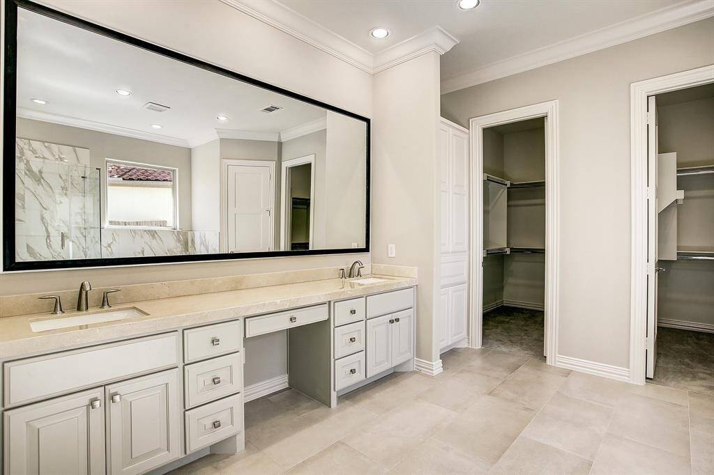 Private bathroom for guest with standing shower.