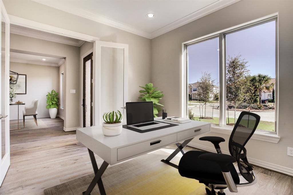 Study showing French doors for privacy and large double windows.