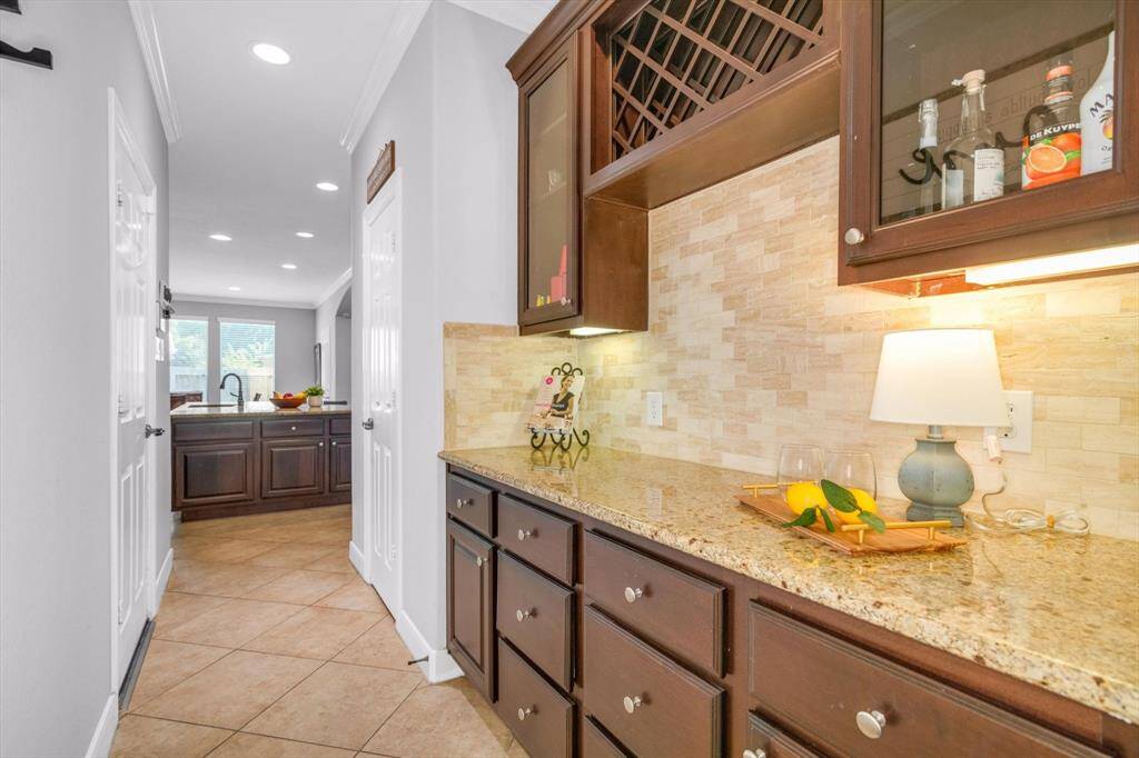 Great sized butler's pantry with electrical outlets.  The regular walk in pantry is the door on the right.  The door on the left goes to the 3 car garage