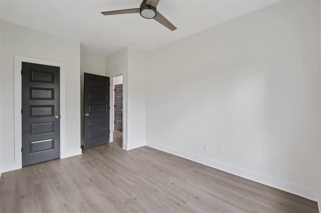 Another view of second bedroom. *photos are from builders previous model home with same layout and fixtures*