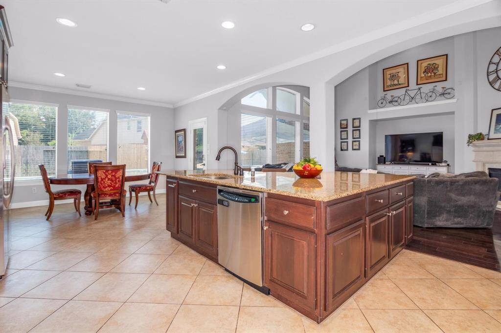 The kitchen, family room and master suite all open to the back with open views of the pool and backyard