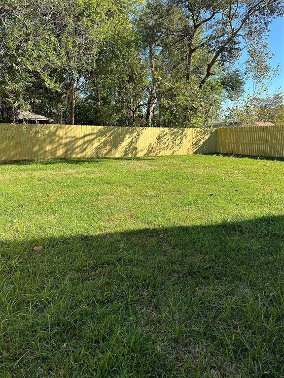 Spacious backyard for fur babies.