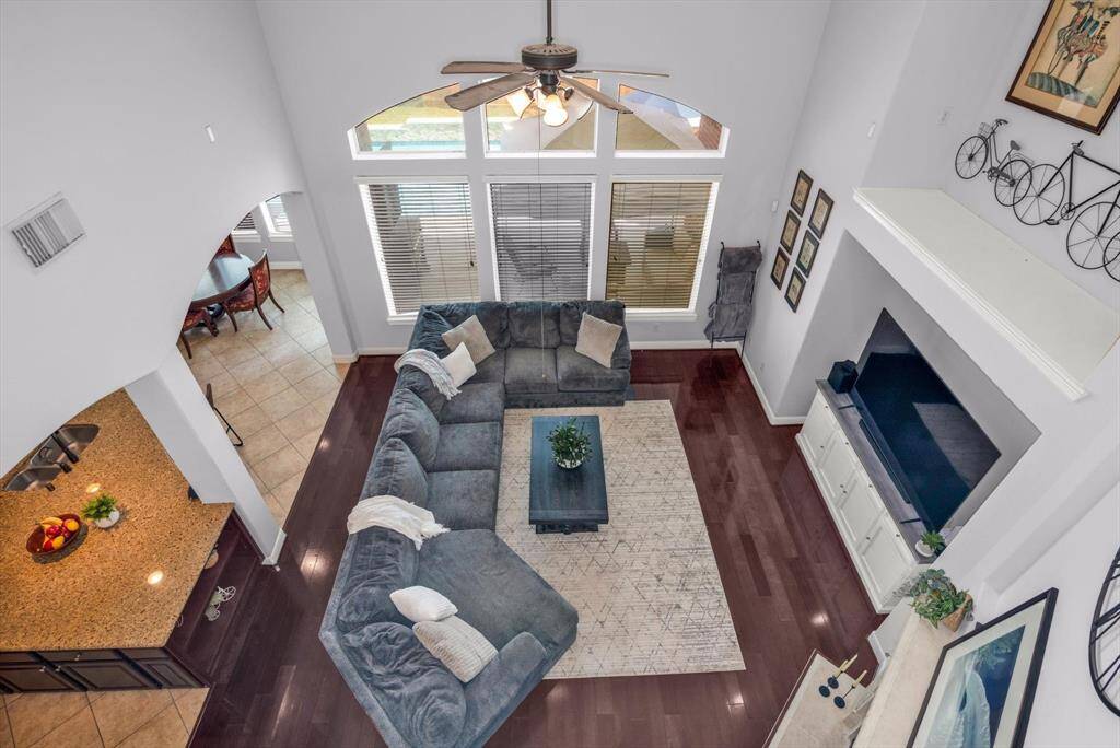 Nice tall ceiling and plenty of natural light.  Two fireplaces - one in the family room and the other in the master suite